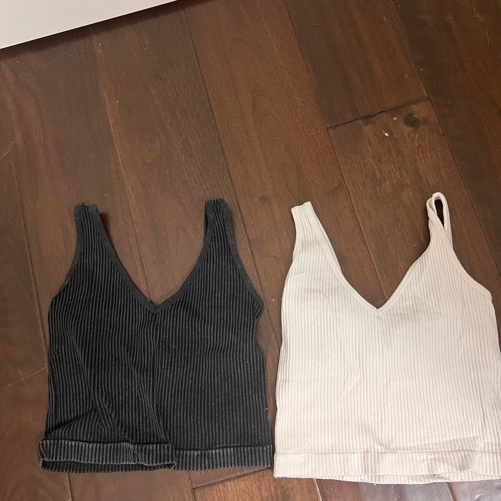 Black and white ribbed tanks